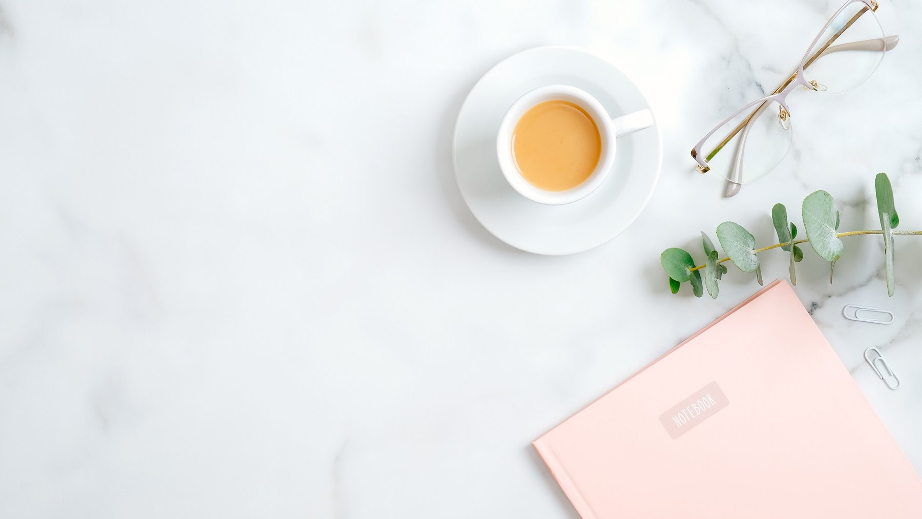 Cozy Home Office Desk with Tea and Notebook